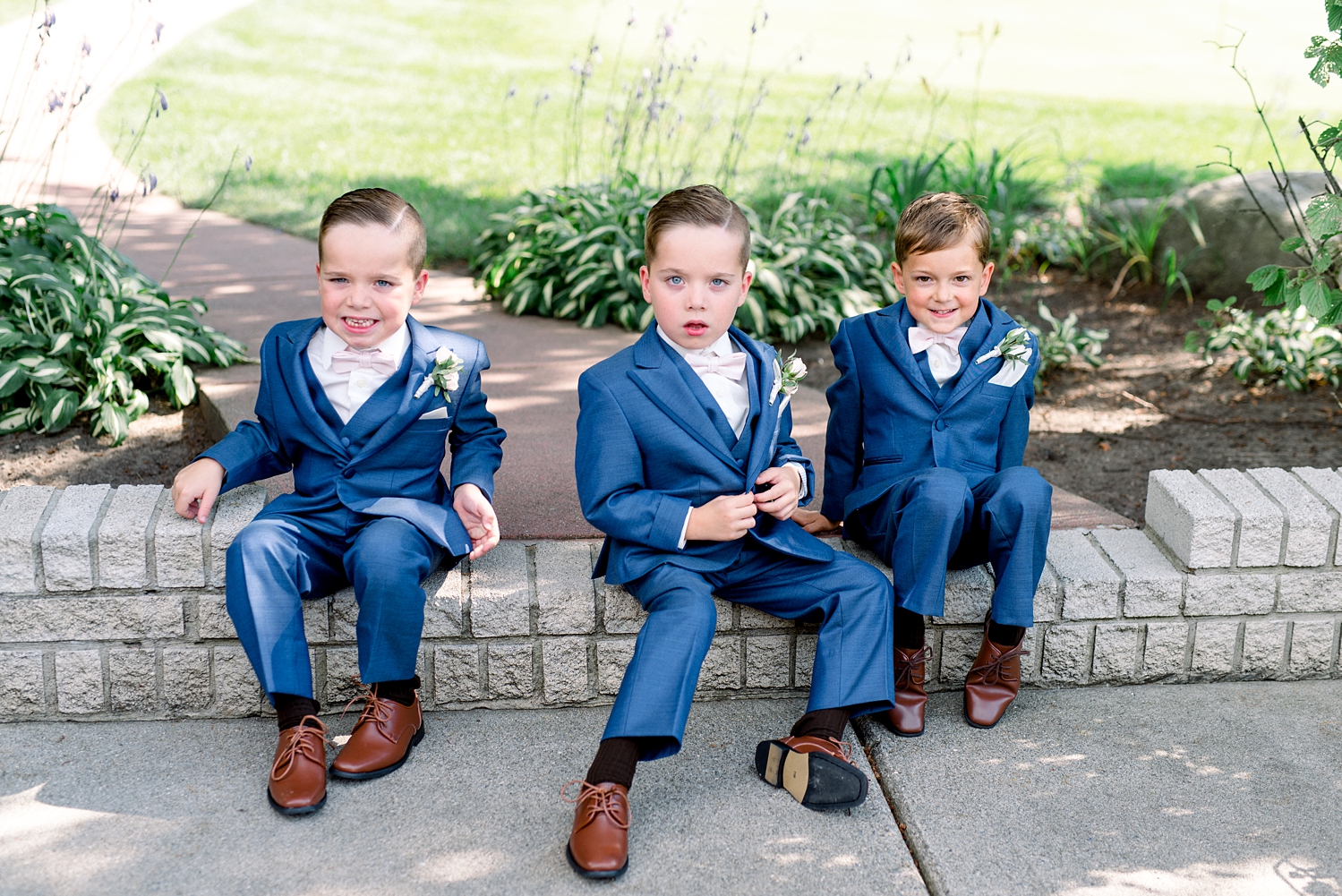 Ring bearers in blue suits